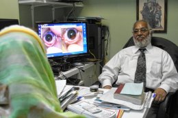Dr. Mohsin Khan, a specialist in Ayurvedic medicine, a 5,000-year-old Indian system of traditional healing, sees a patient at Sandeep Ayurvedic in Jackson Heights.