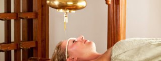 Shanthi_Ayurveda_Ashram_Treatments_Shirodhara.jpg