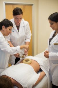 Students Practicing Ayurvedic Therapies